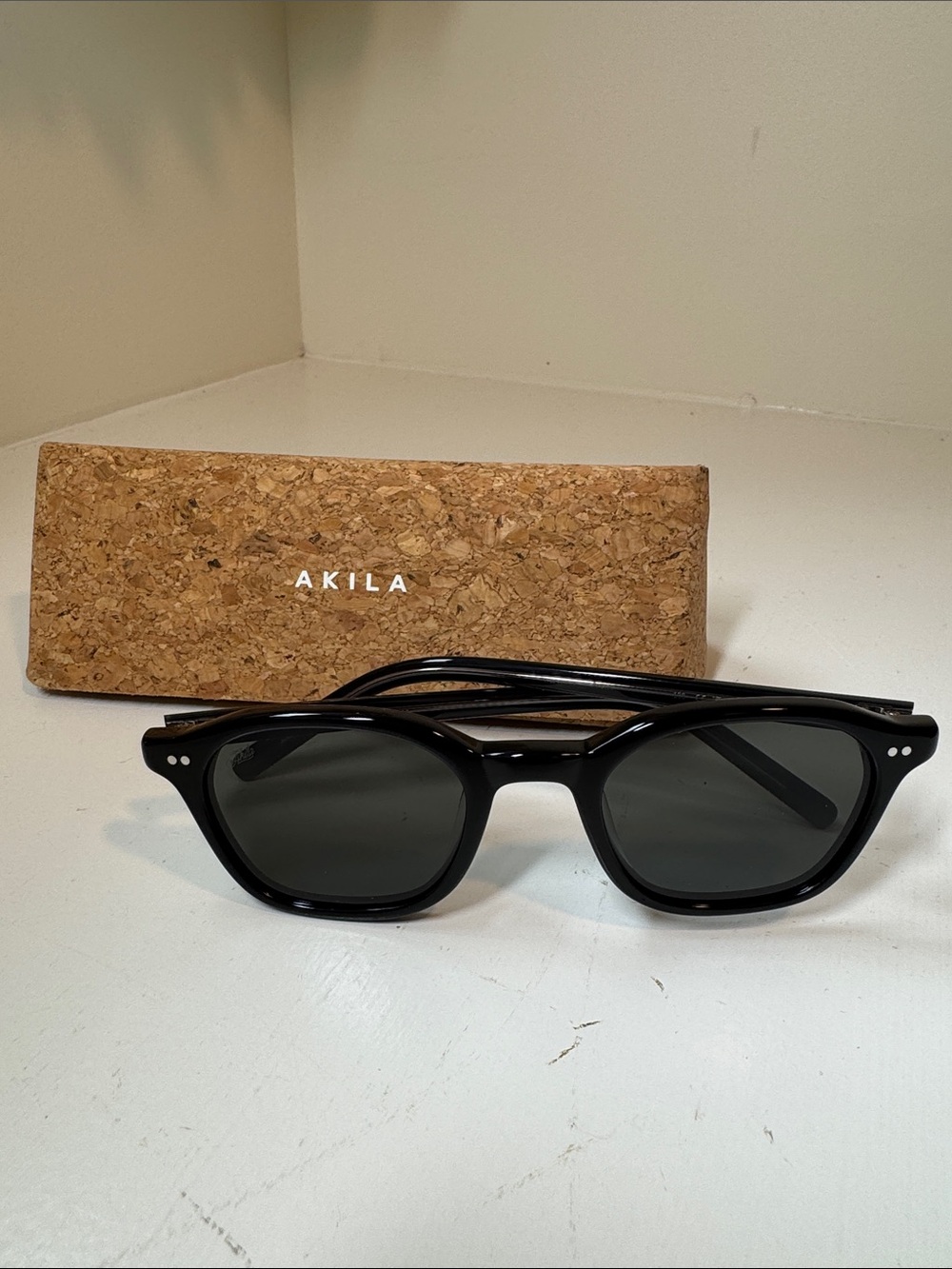 Akila sunglasses with branded cork case.